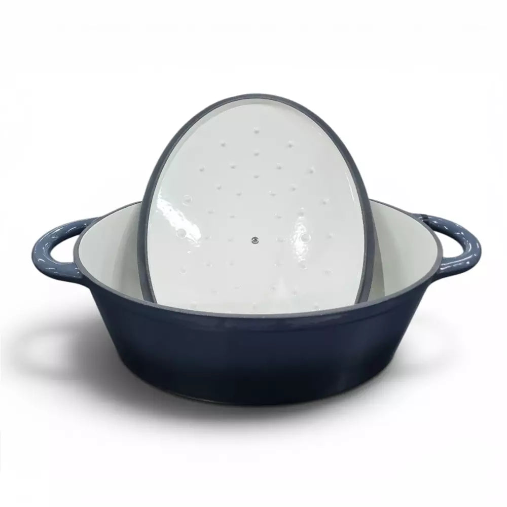 Grey enameled cast iron pot with a white interior and speckled lid on a white background