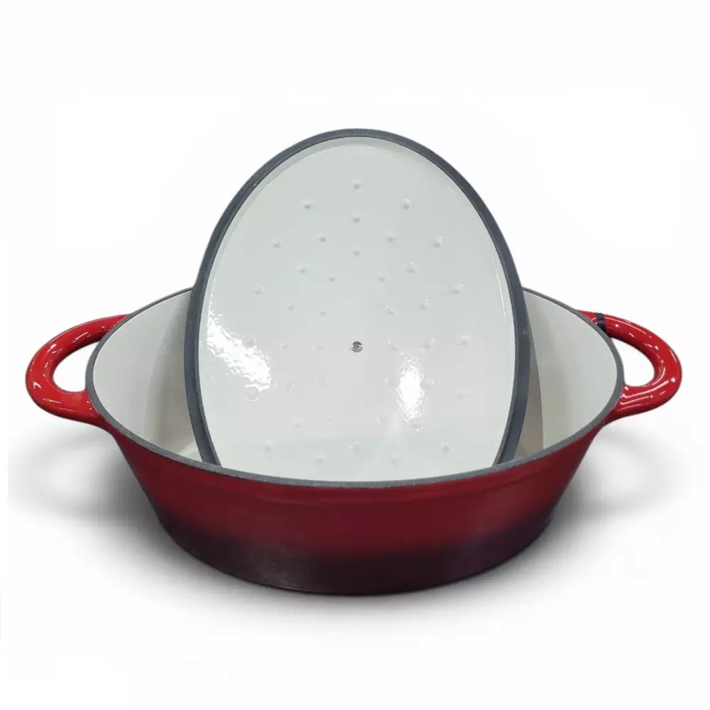 Red enameled cast iron pot with a white speckled pattern on the lid against a white background