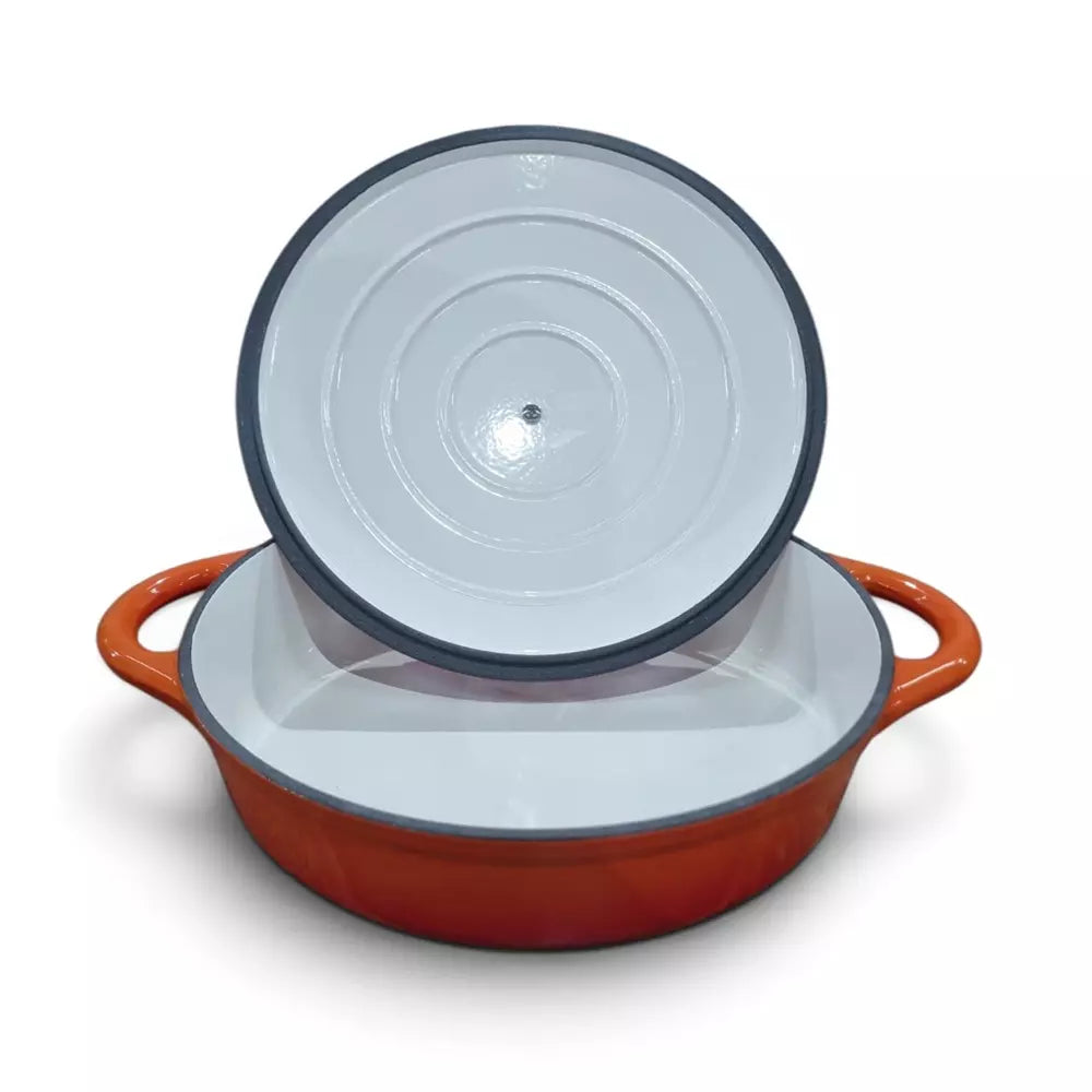 A Le Morgan Flame Orange Cast Iron Shallow Casserole Pot, on a white background