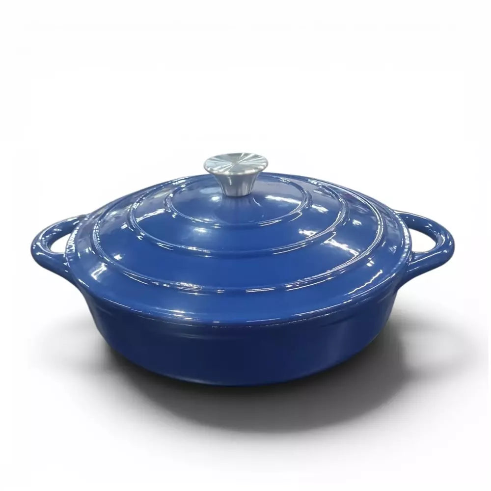 Blue enameled cast iron casserole dish with lid on a white background