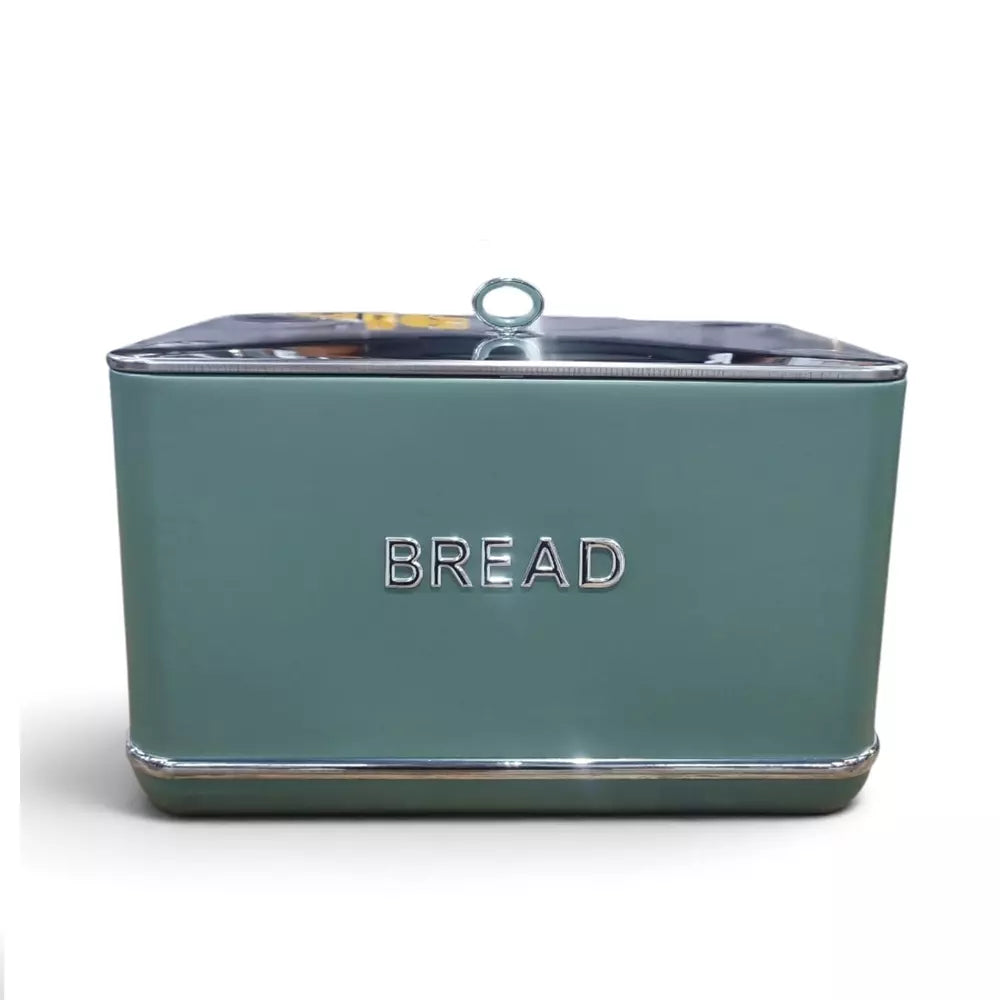A le Morgan Green bread box with a matte sage green body, silver metallic trim, and the word 'BREAD' in silver lettering on the front. It has a clear plastic lid with a small metal loop handle on top, shown against a plain white background.