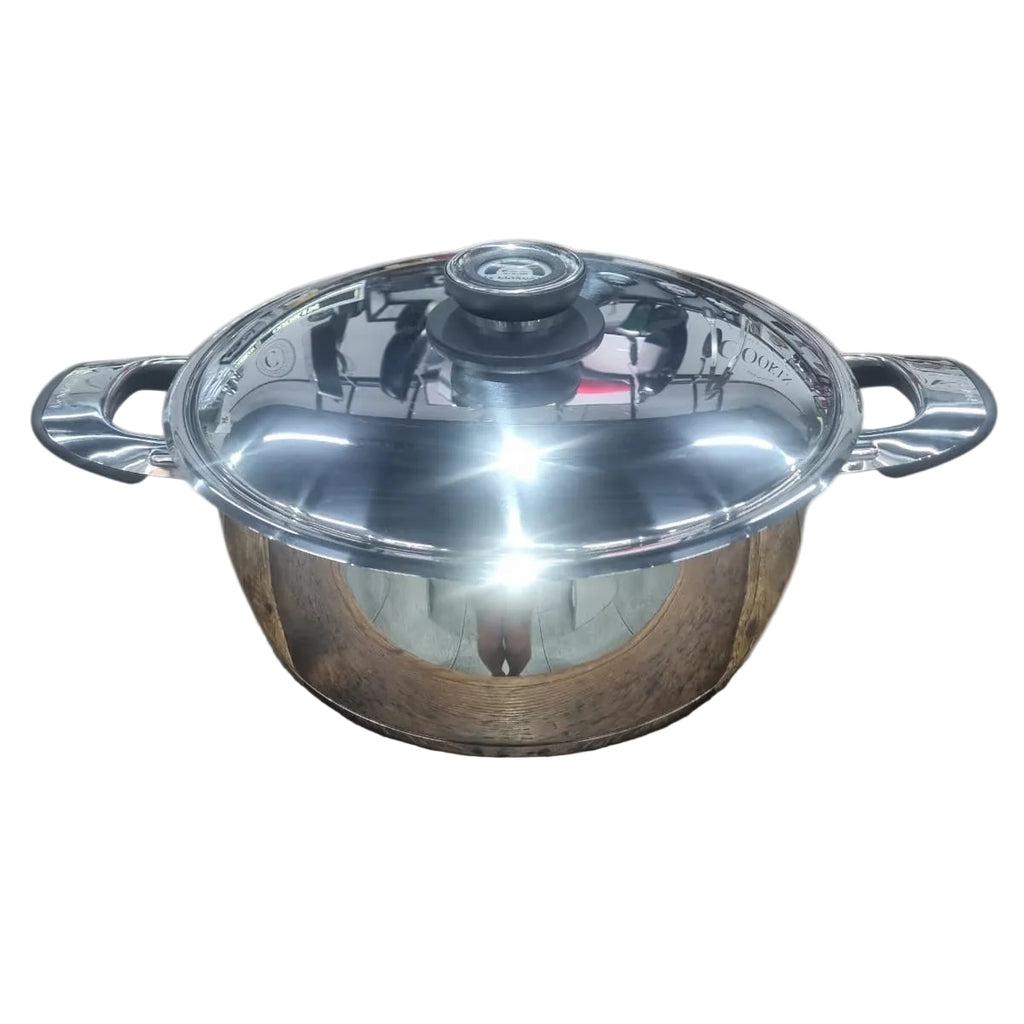 Stainless steel pot with a clear glass lid on a white background
