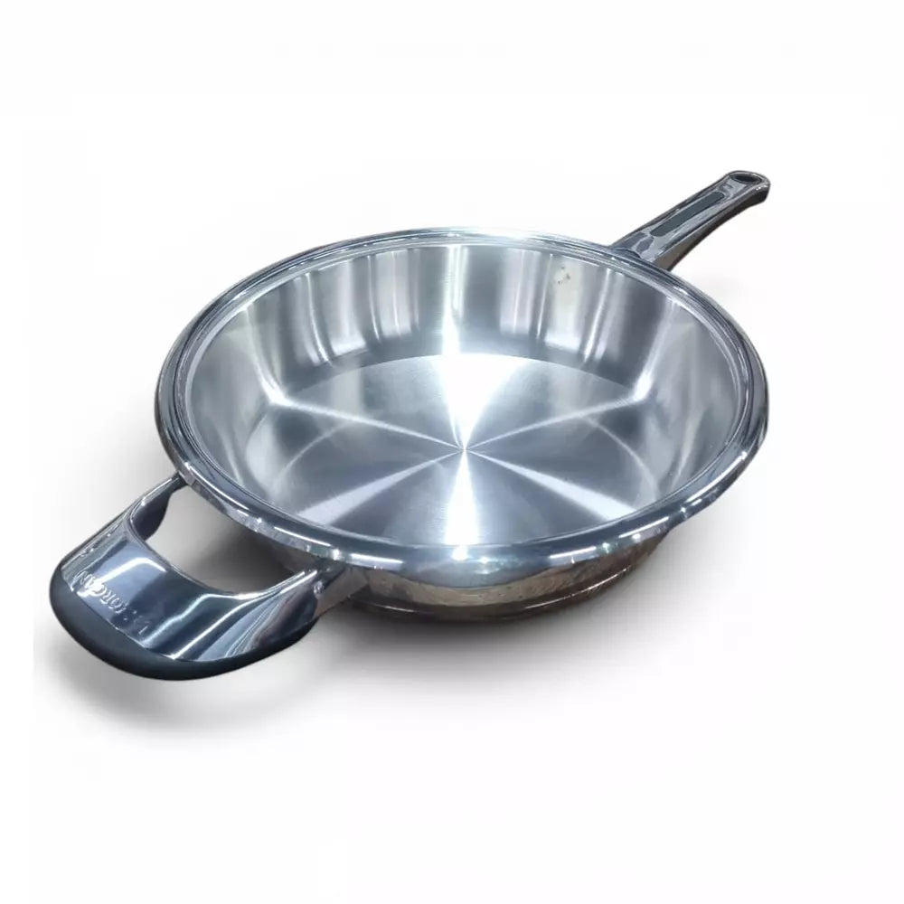 Stainless steel frying pan on a white background