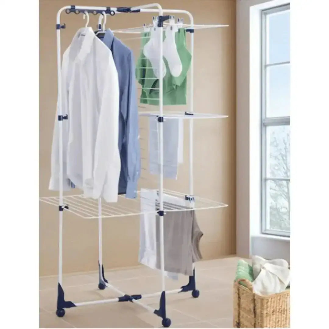 Clothing rack with clothes in a room with a window