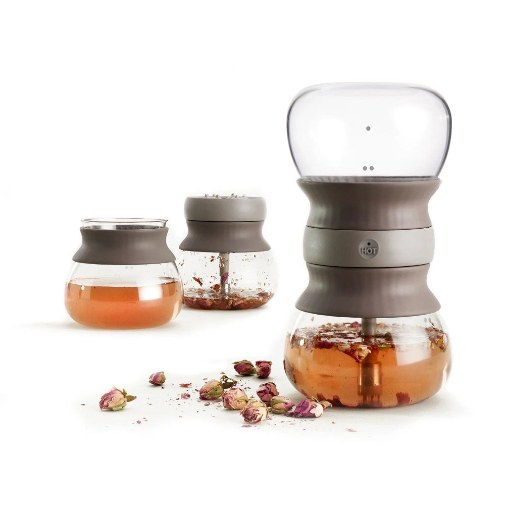 Glass tea infuser with a white background 