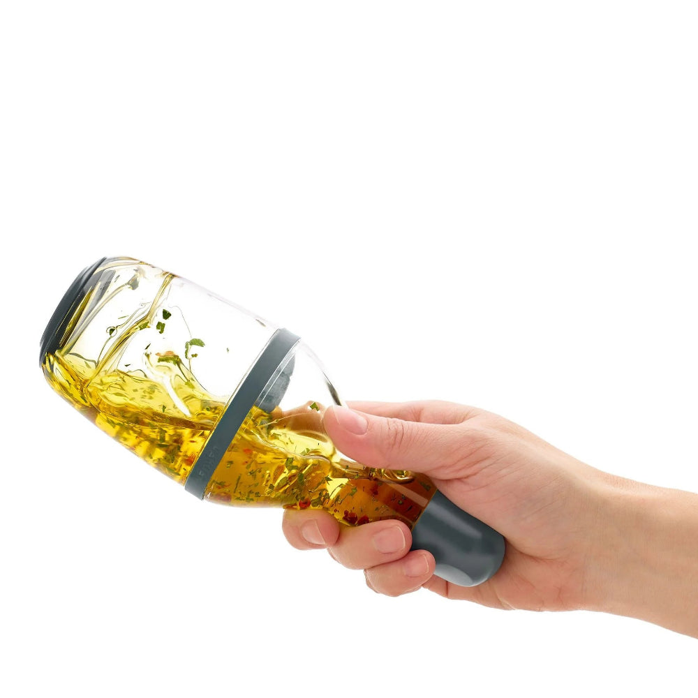 Hand shaking a dressing shaker