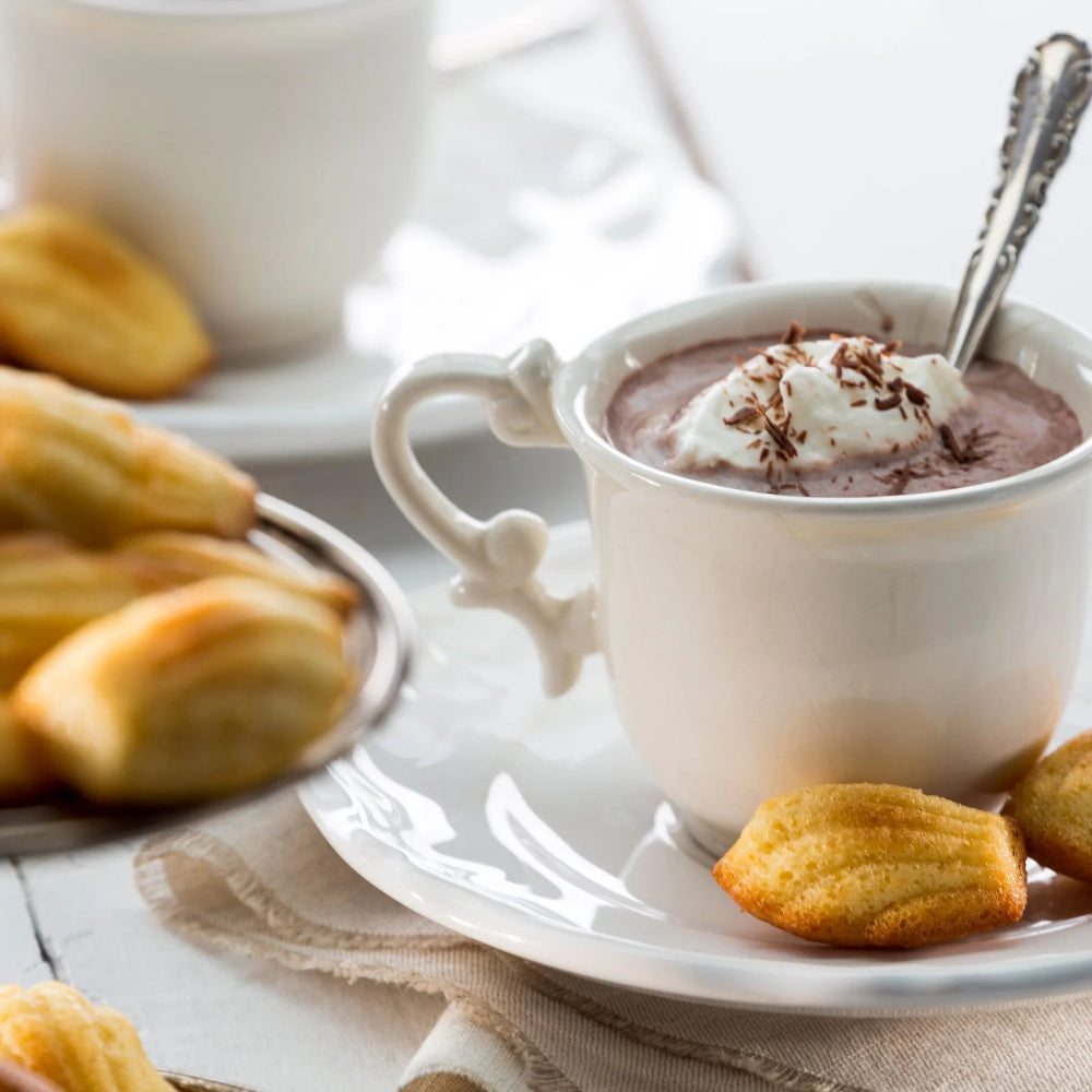 Hot chocolate with madeleine pastries 