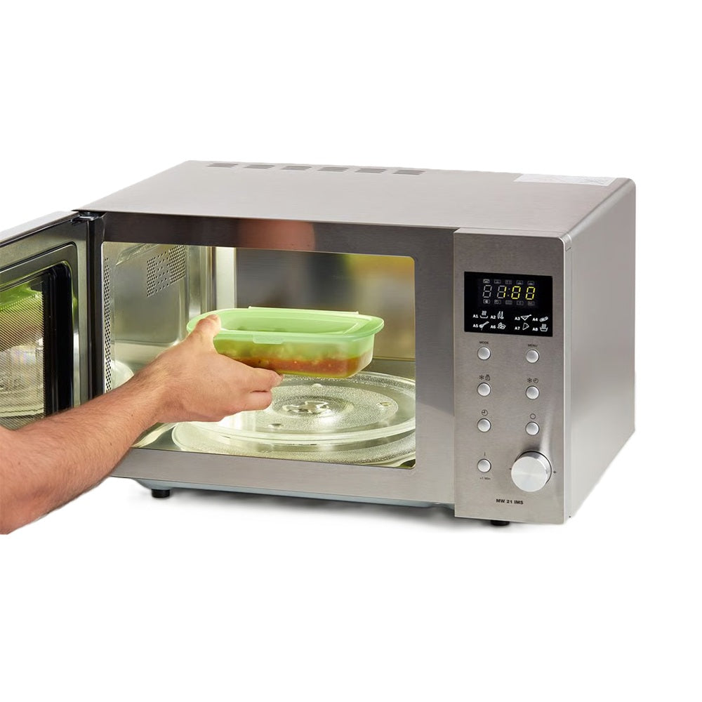 Person removing a container from a microwave with a white background