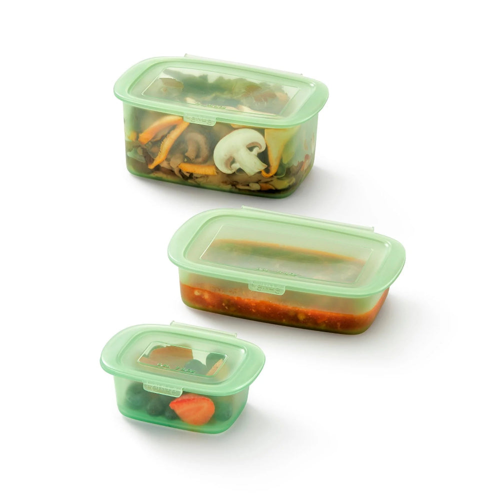 Green food storage containers on a white background 