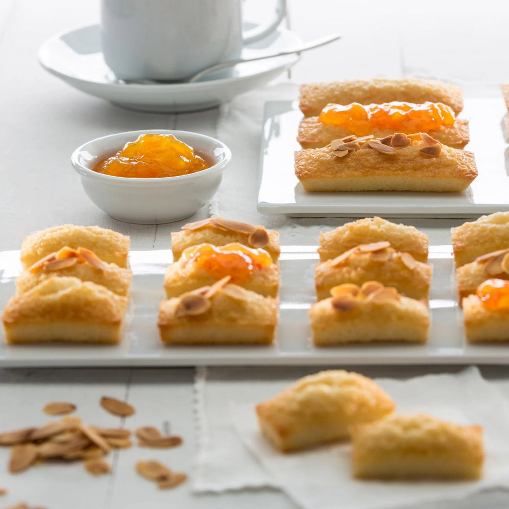 Baked goods with jam on a white surface 