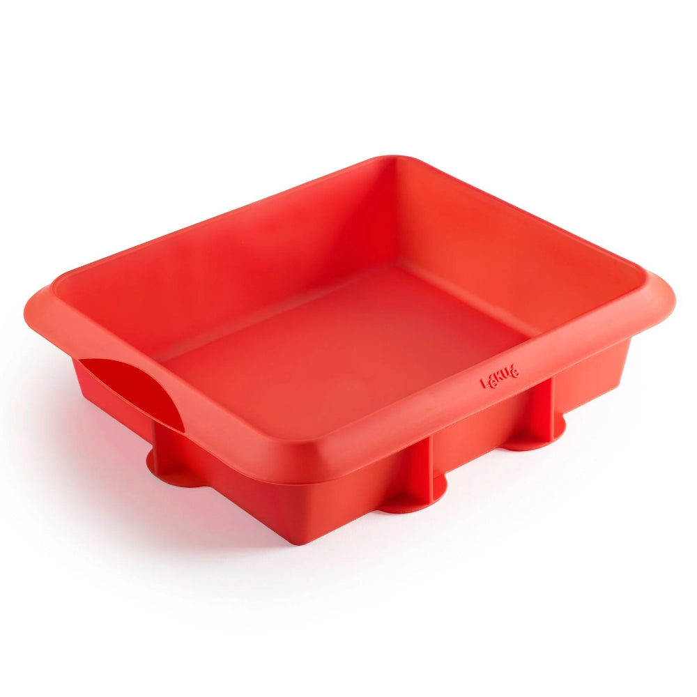 Red silicone baking mould with a white background