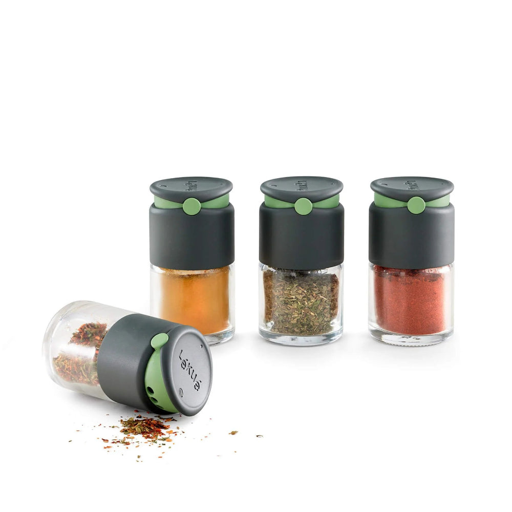 Set of spice shakers with a white background 