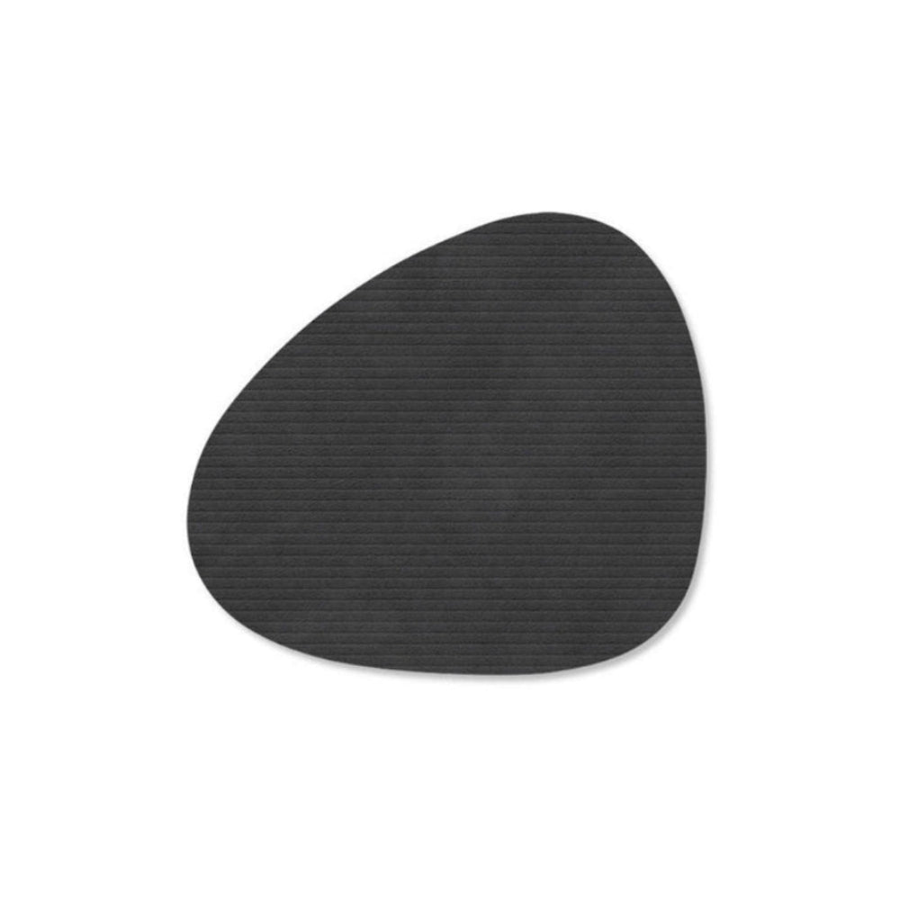 Black textured coaster on a white background.