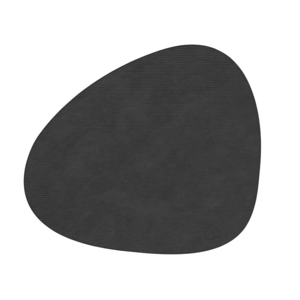 Black rubber mat with a unique shape on a white background