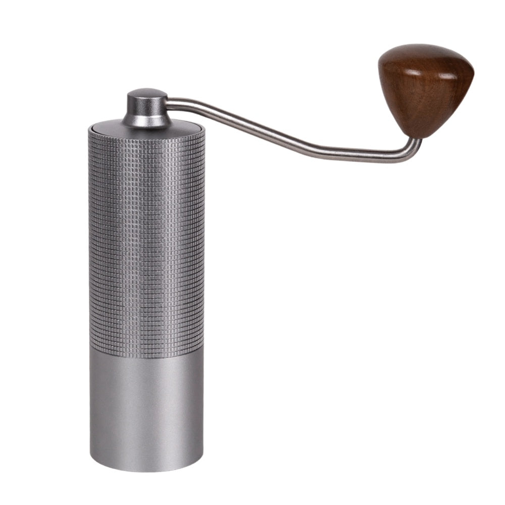 Hand coffee grinder with wooden handle on a white background