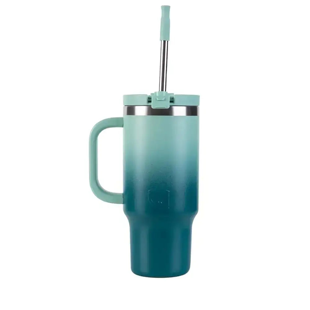 Teal mug with handle and straw lid on a white background