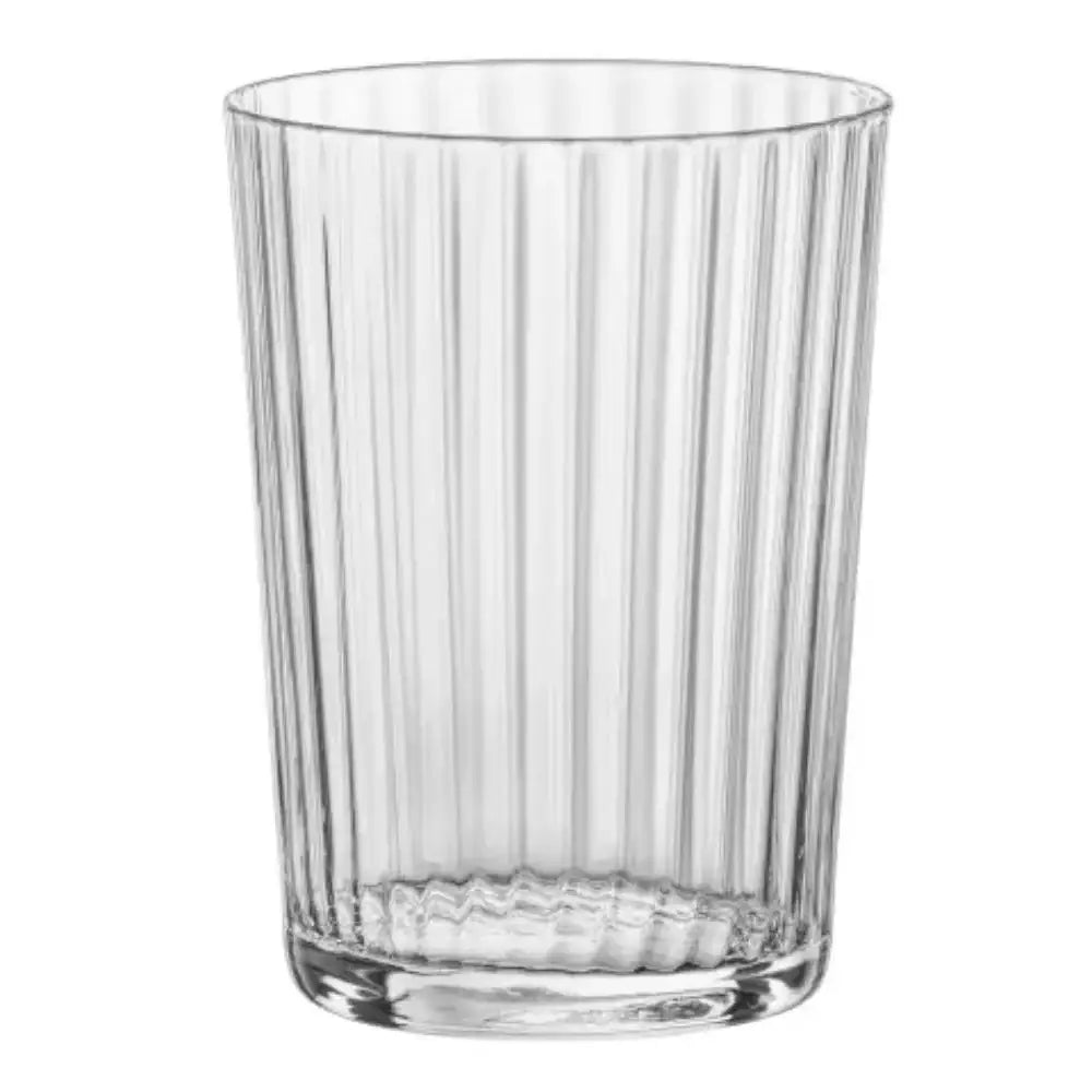 Clear glass tumbler with vertical ribbing on a white background
