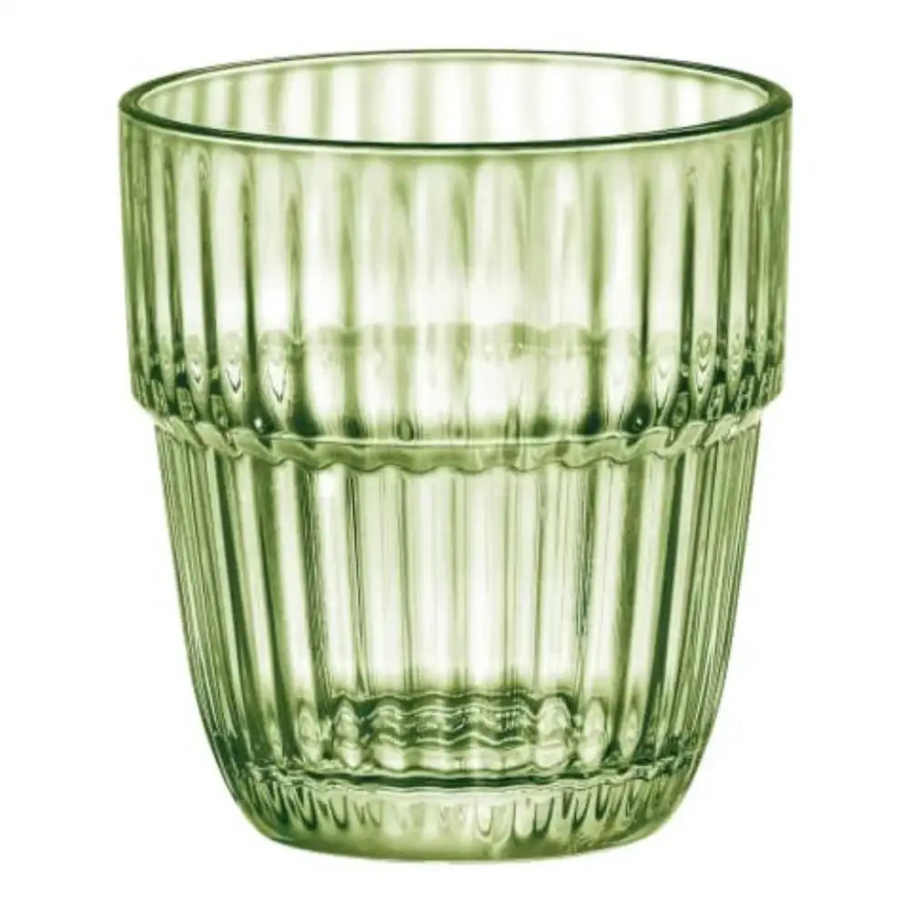 Green glass tumbler with ribbed texture on a white background