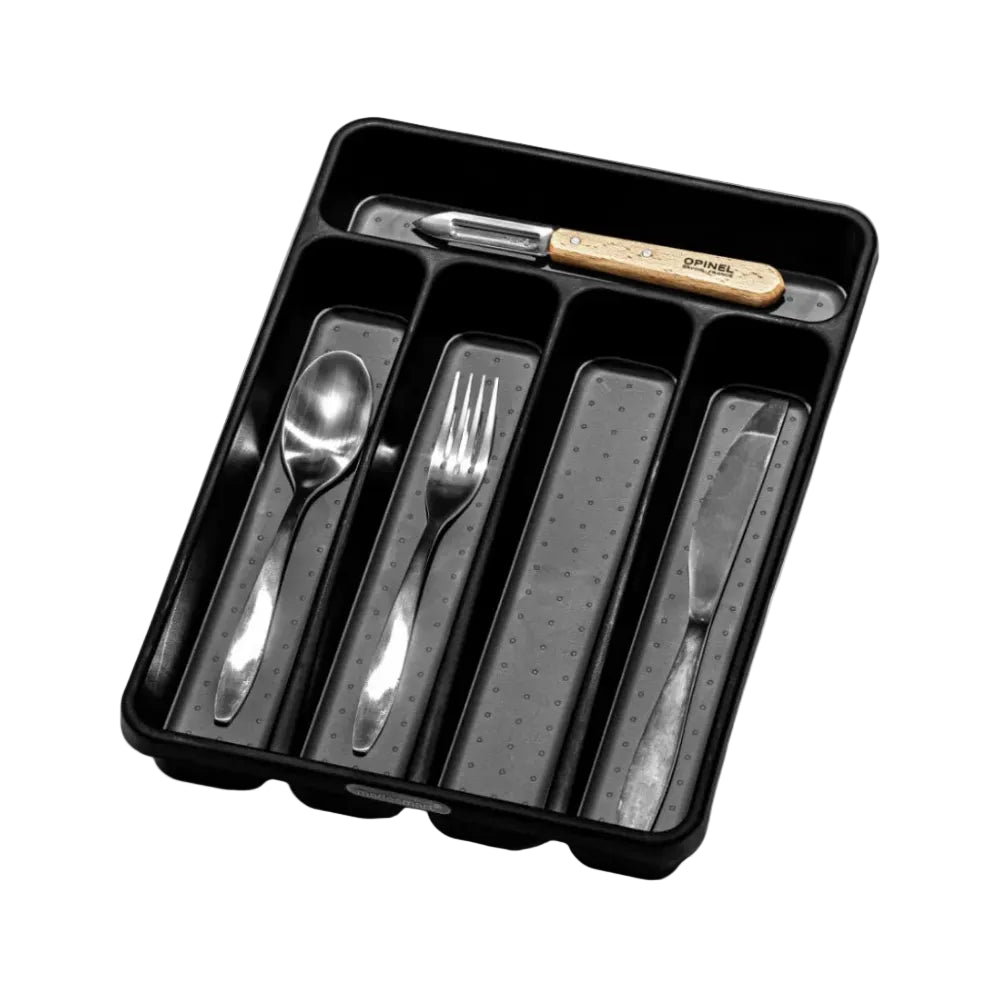 Black cutlery organizer with silver cutlery inside on a white background