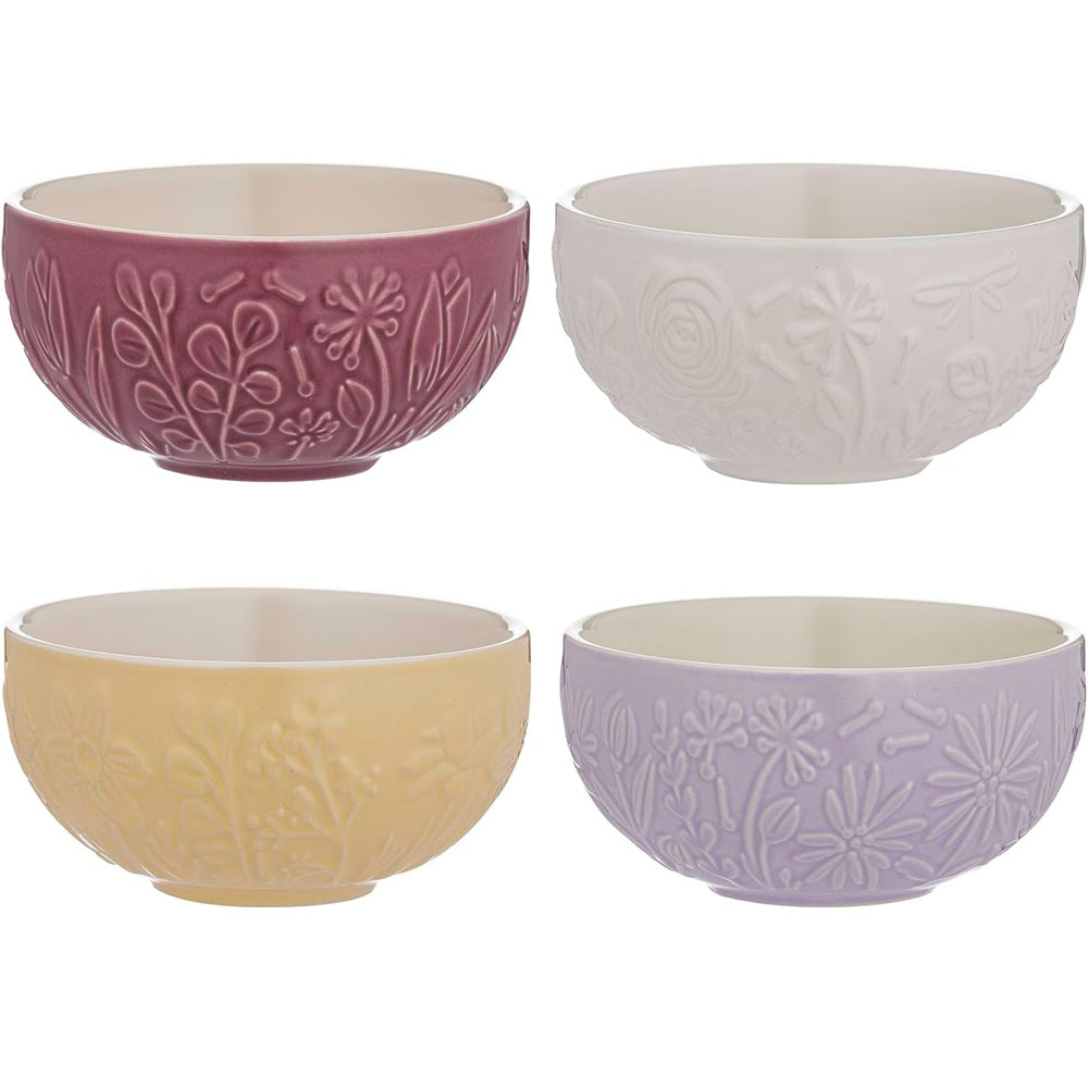 Set of four ceramic bowls with floral patterns in different colors on a white background