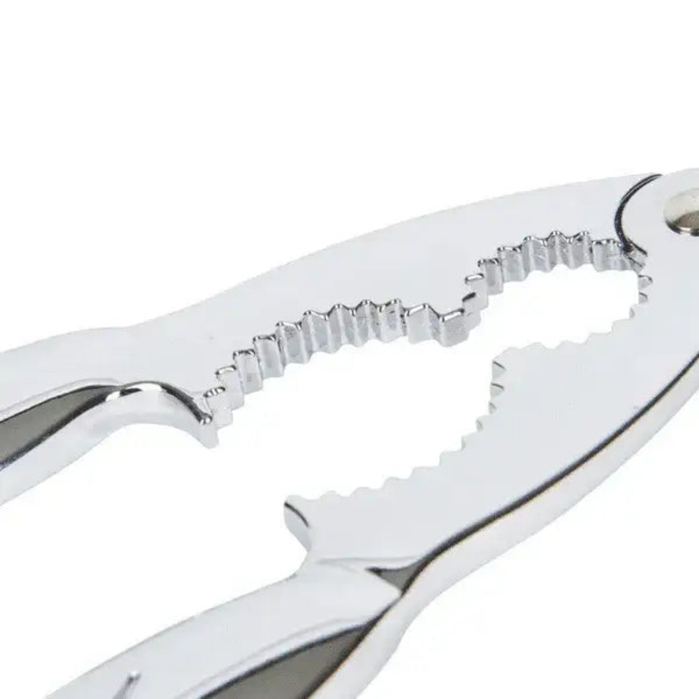 Close-up of a silver metal tool with a detailed design on a white background