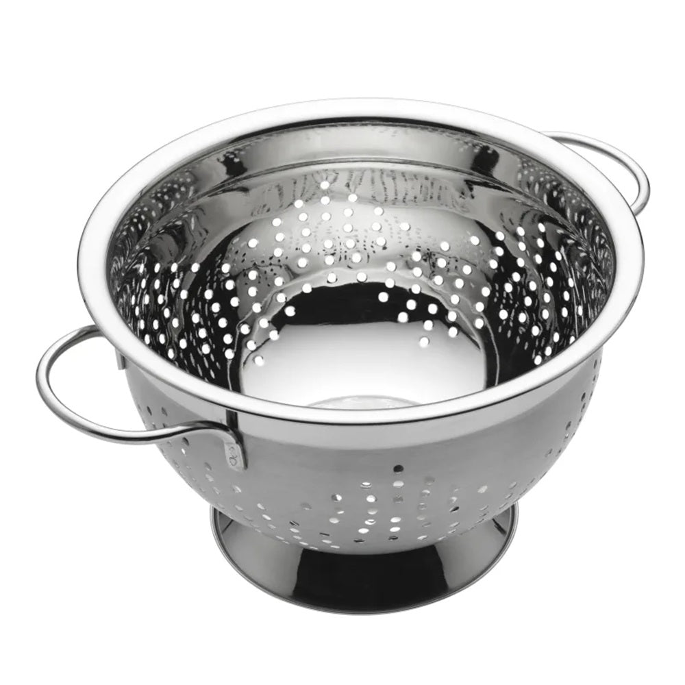 Stainless steel colander on a white background