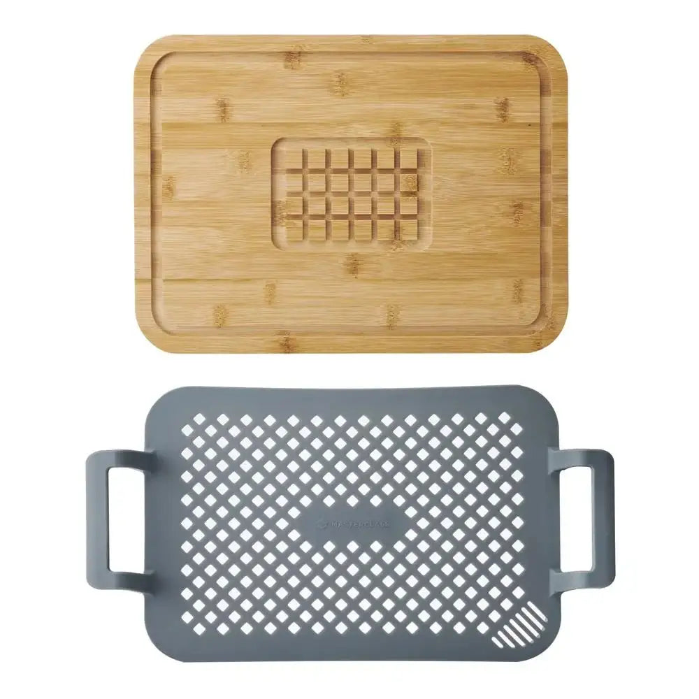 Bamboo cutting board with a grid pattern and gray metal grill pan on a white background