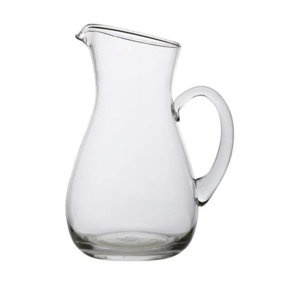 Clear glass pitcher on a white background