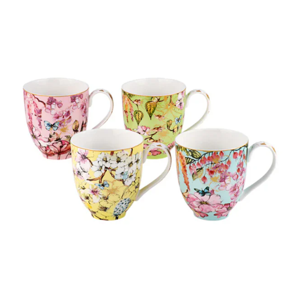 Set of four floral mugs on a white background