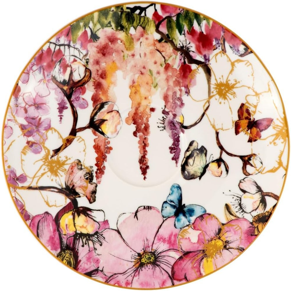 Decorative plate with floral and butterfly design on a white background