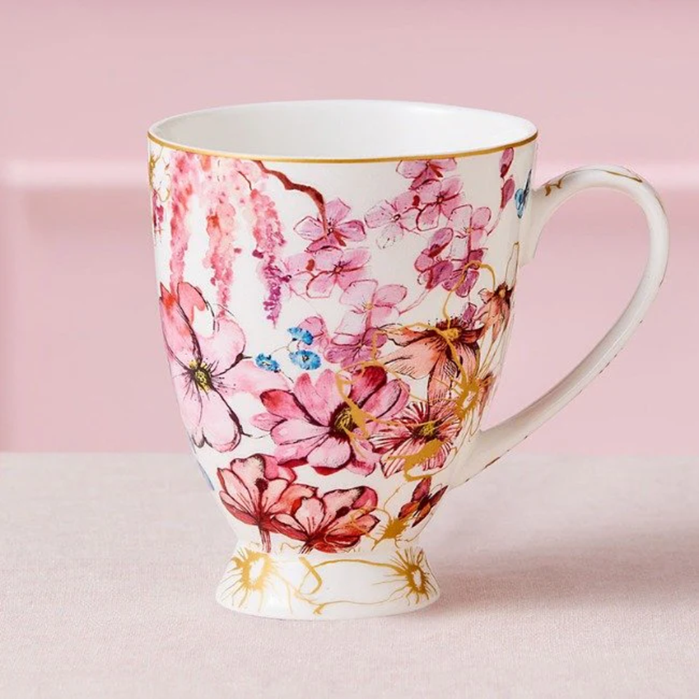 Floral mug with pink flowers on a pink background
