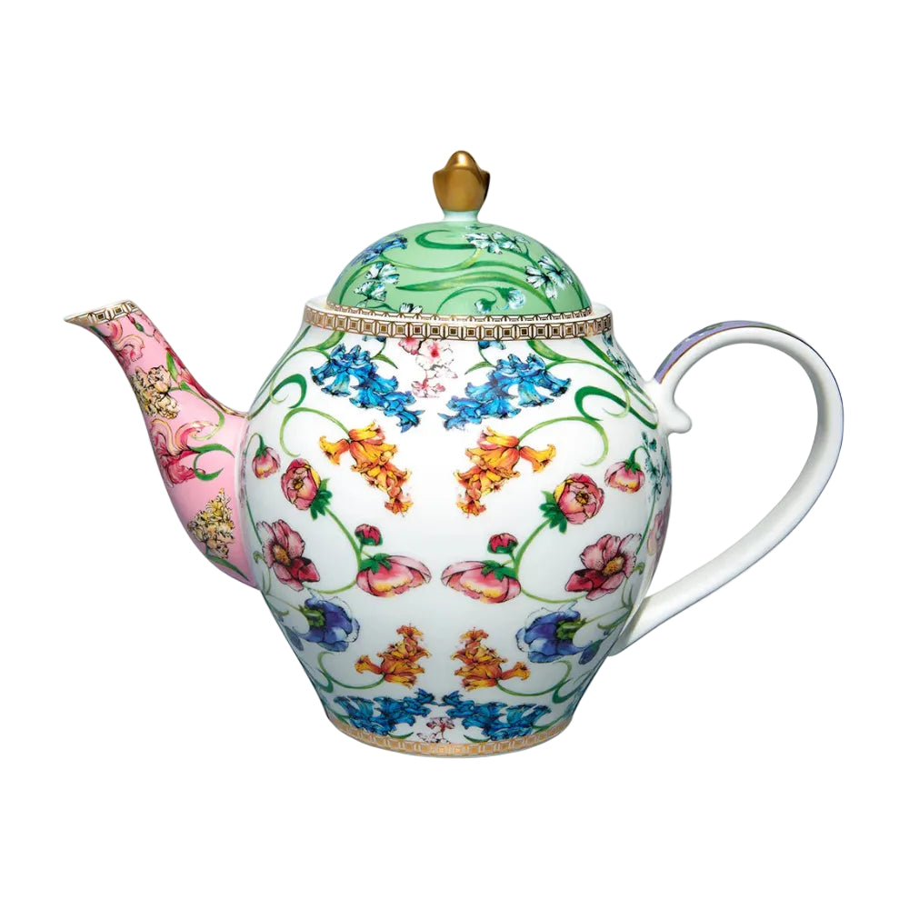 Decorative teapot with floral patterns on a white background
