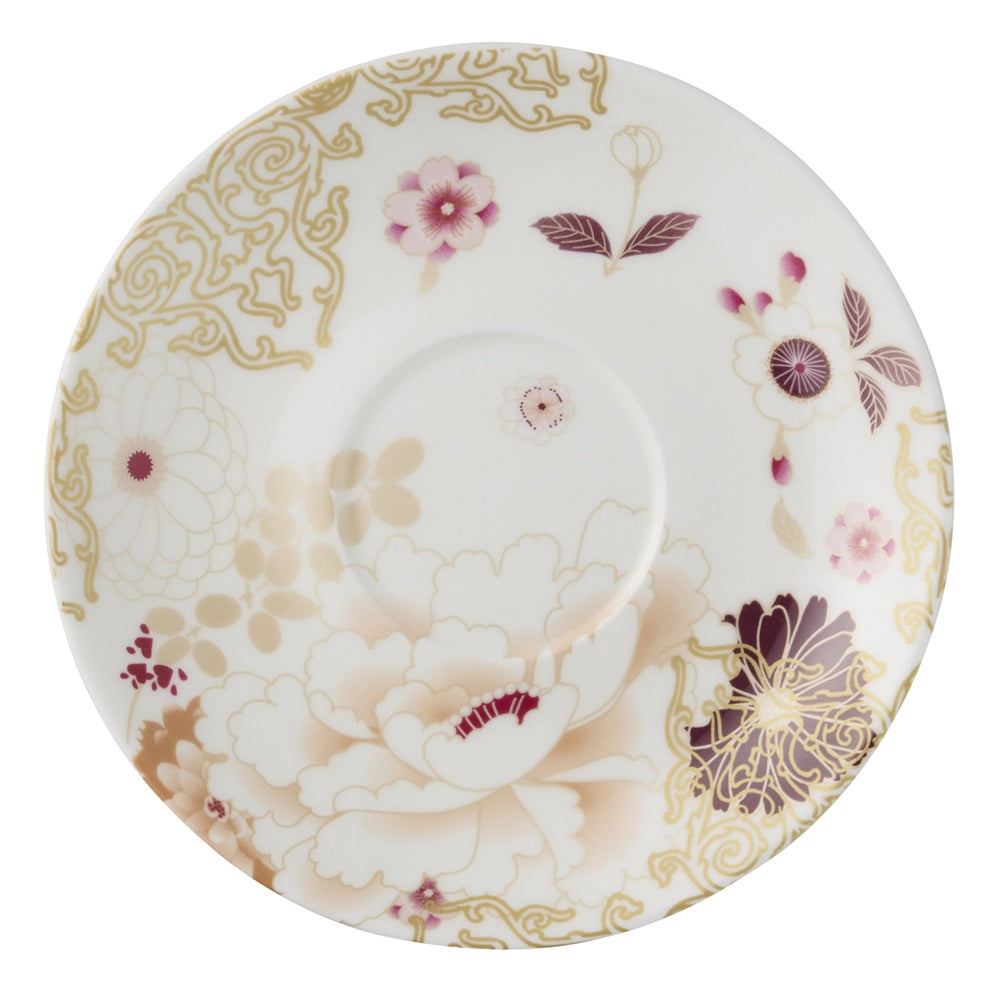 Decorative ceramic plate with floral patterns on a white background