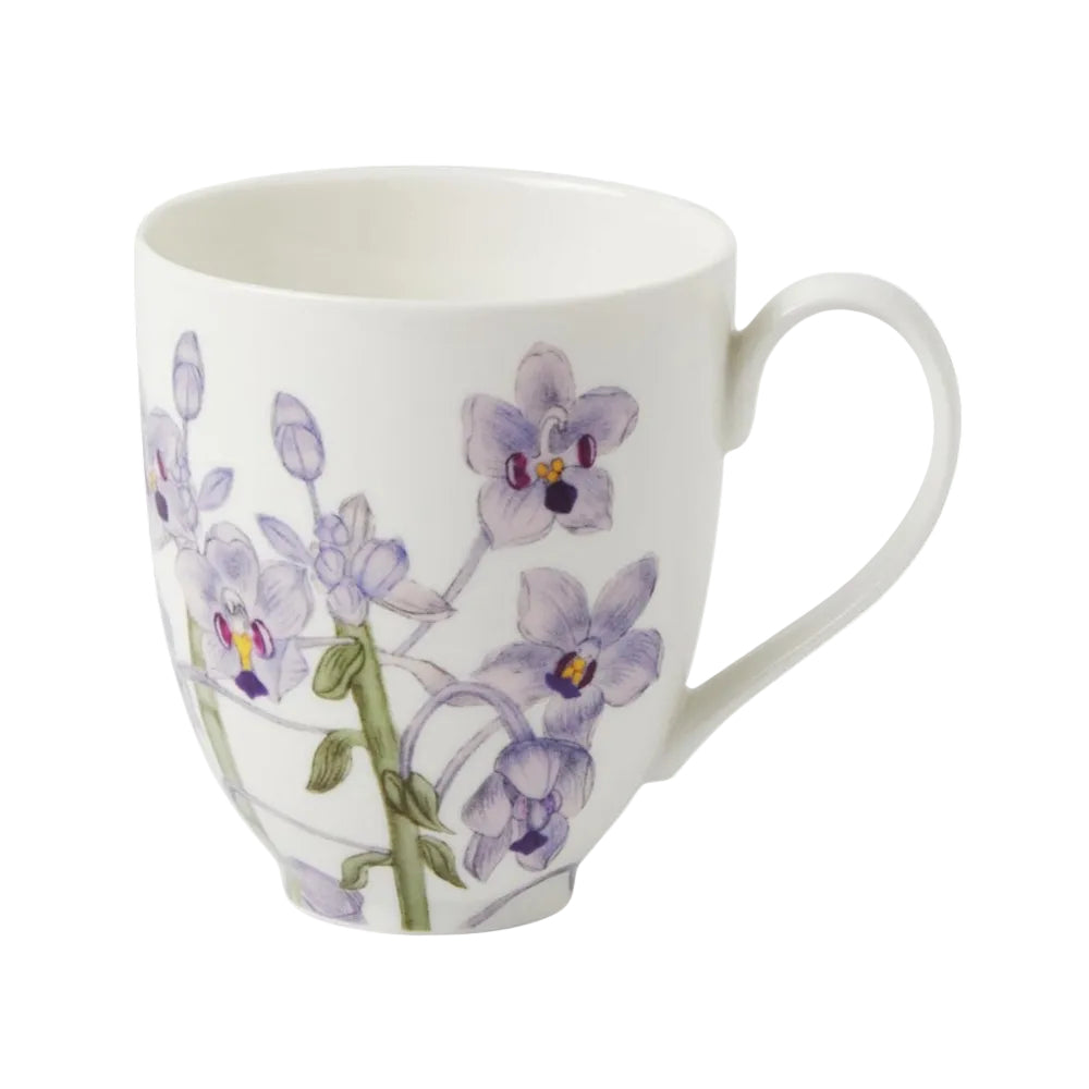 White mug with purple floral design on a white background