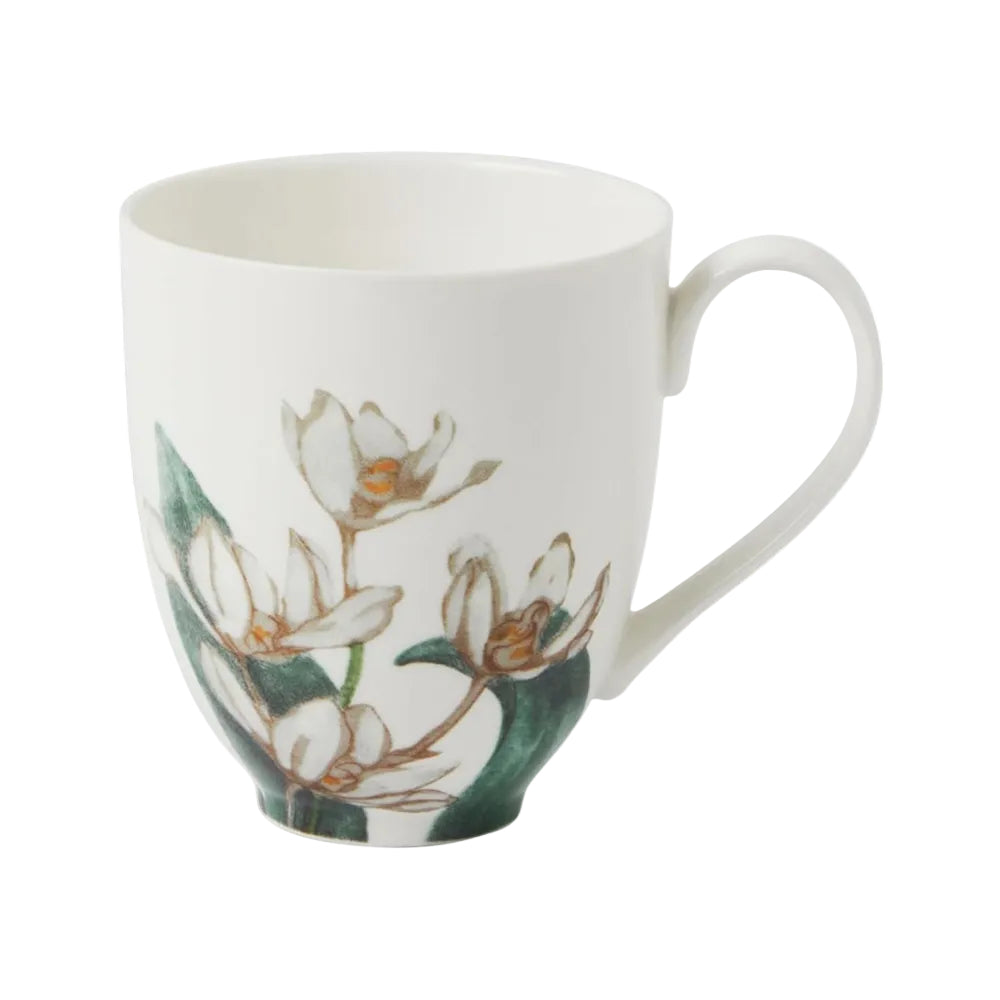 White mug with floral design on a white background