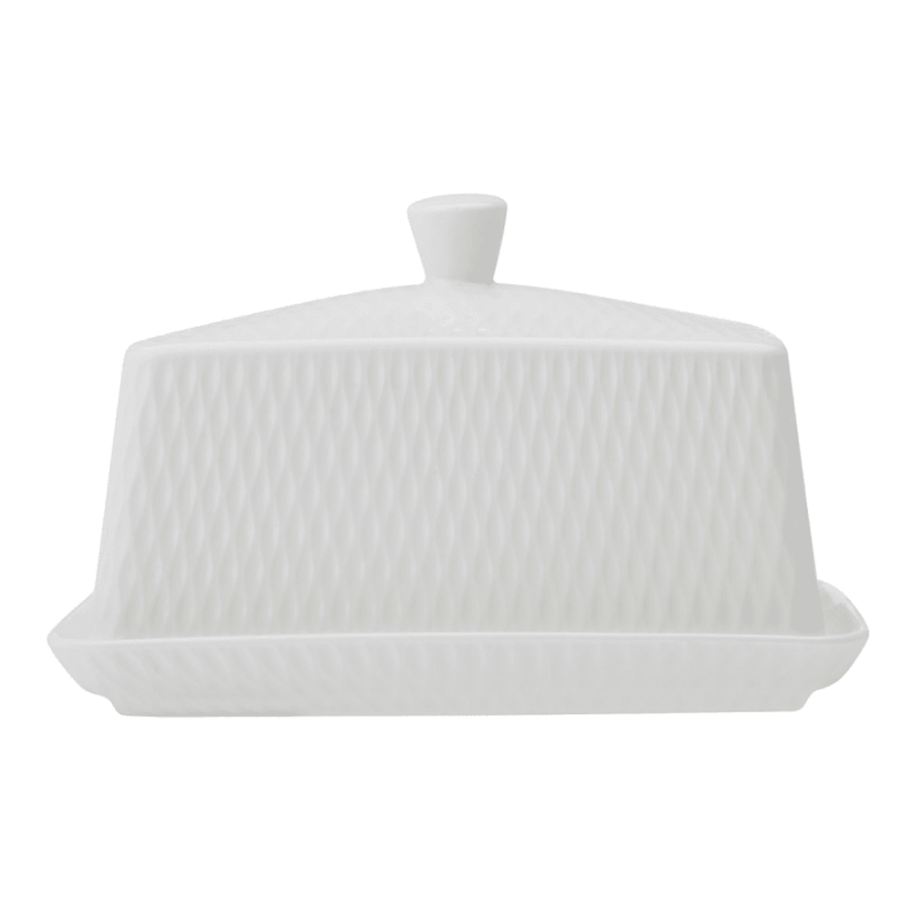 White ceramic butter dish with lid on a white background