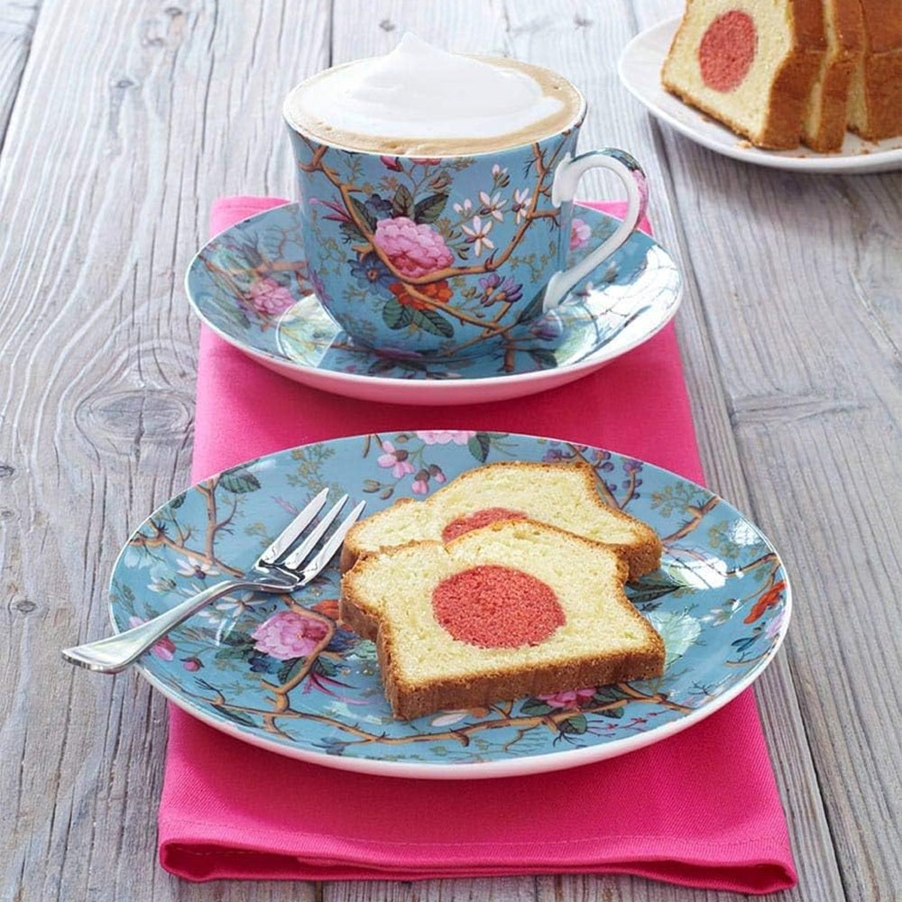 Tea set with floral design on a wooden table