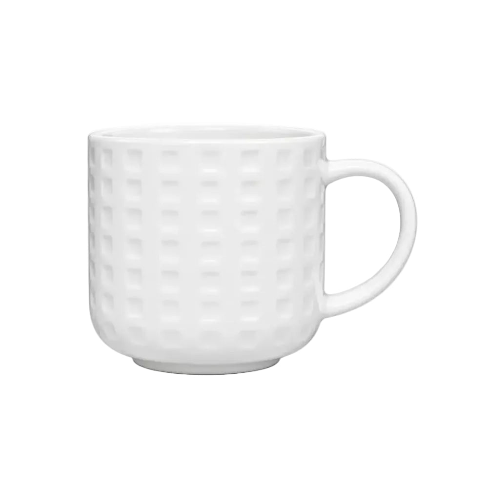 White textured porcelain mug on a white background