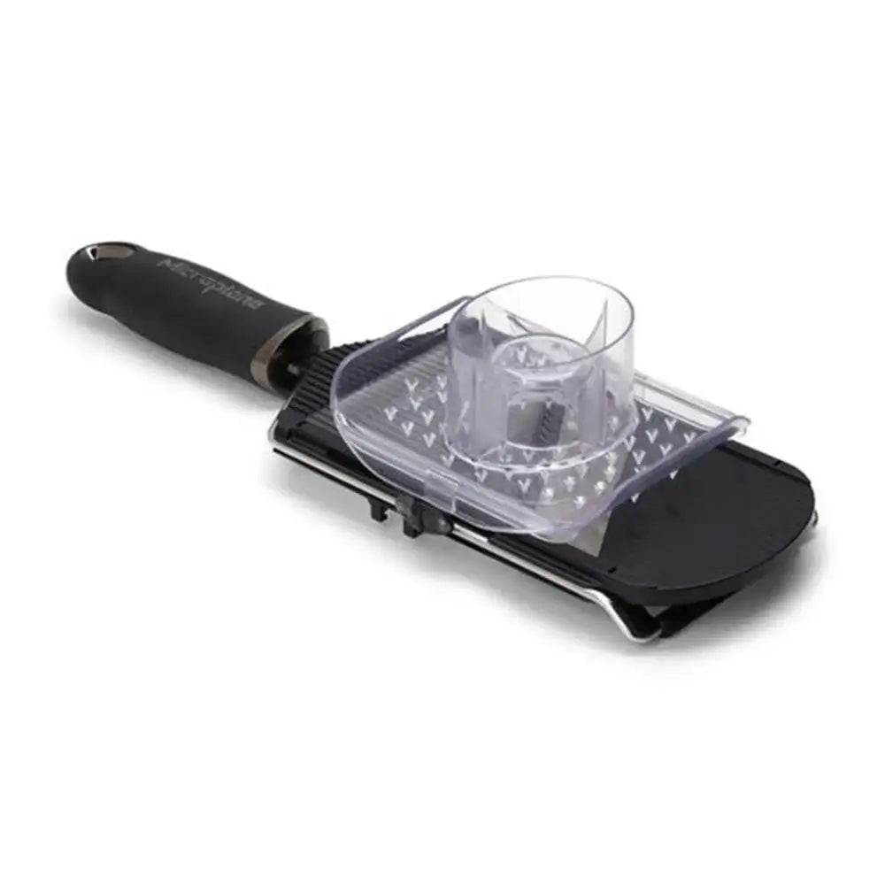 Black and transparent kitchen tool on a white background