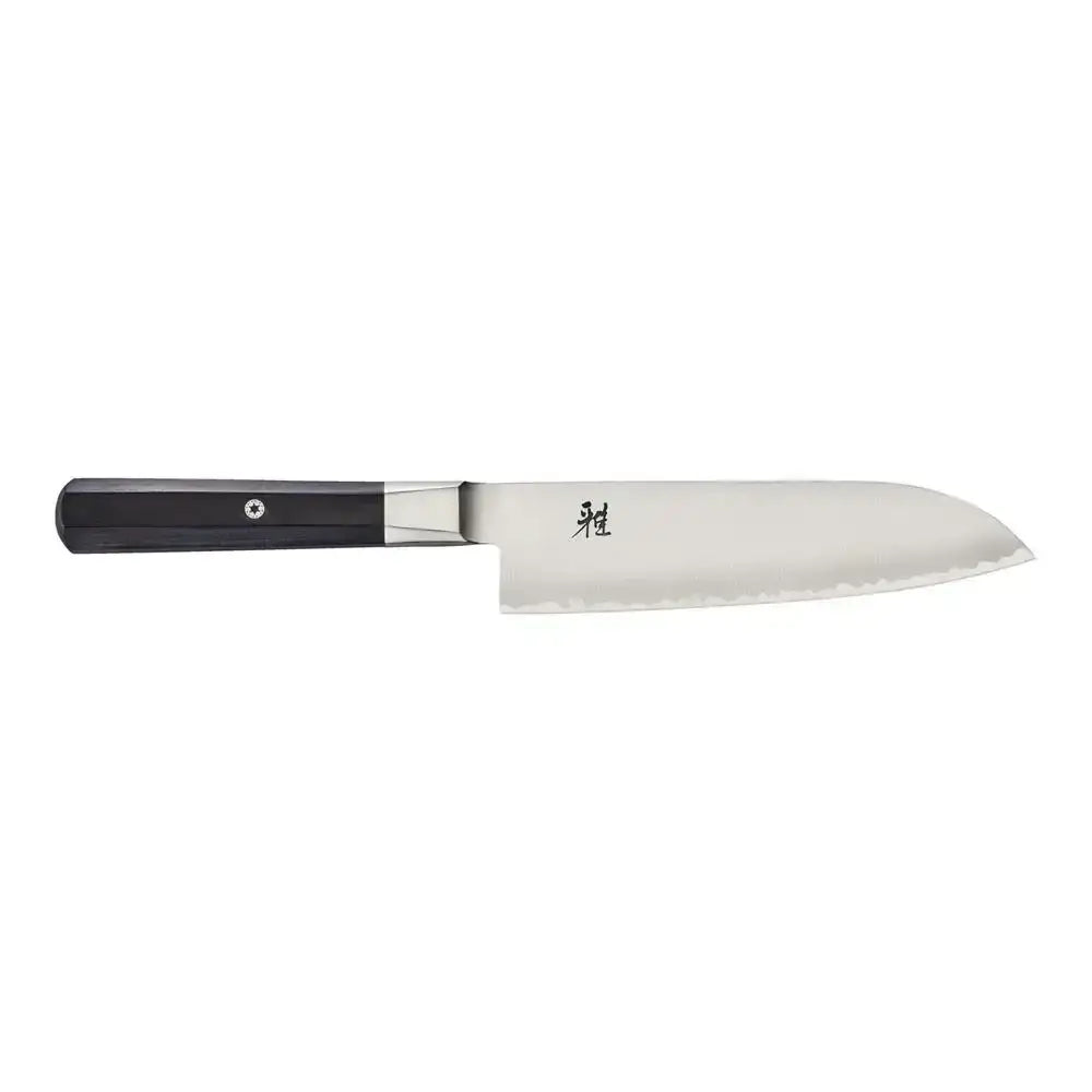 Chef's knife with black handle on a white background