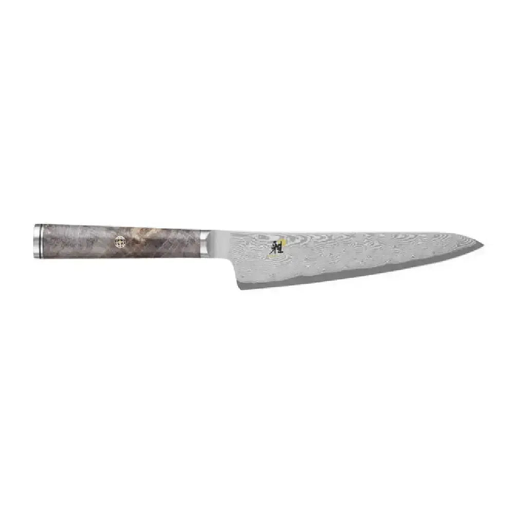 Chef's knife with a decorative handle on a white background