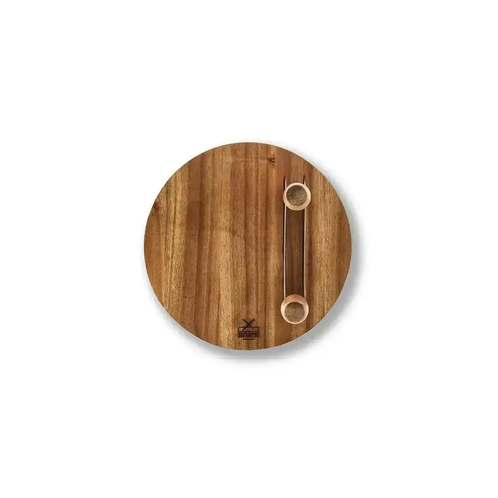 Wooden circular cutting board with two wooden skewers on a white background
