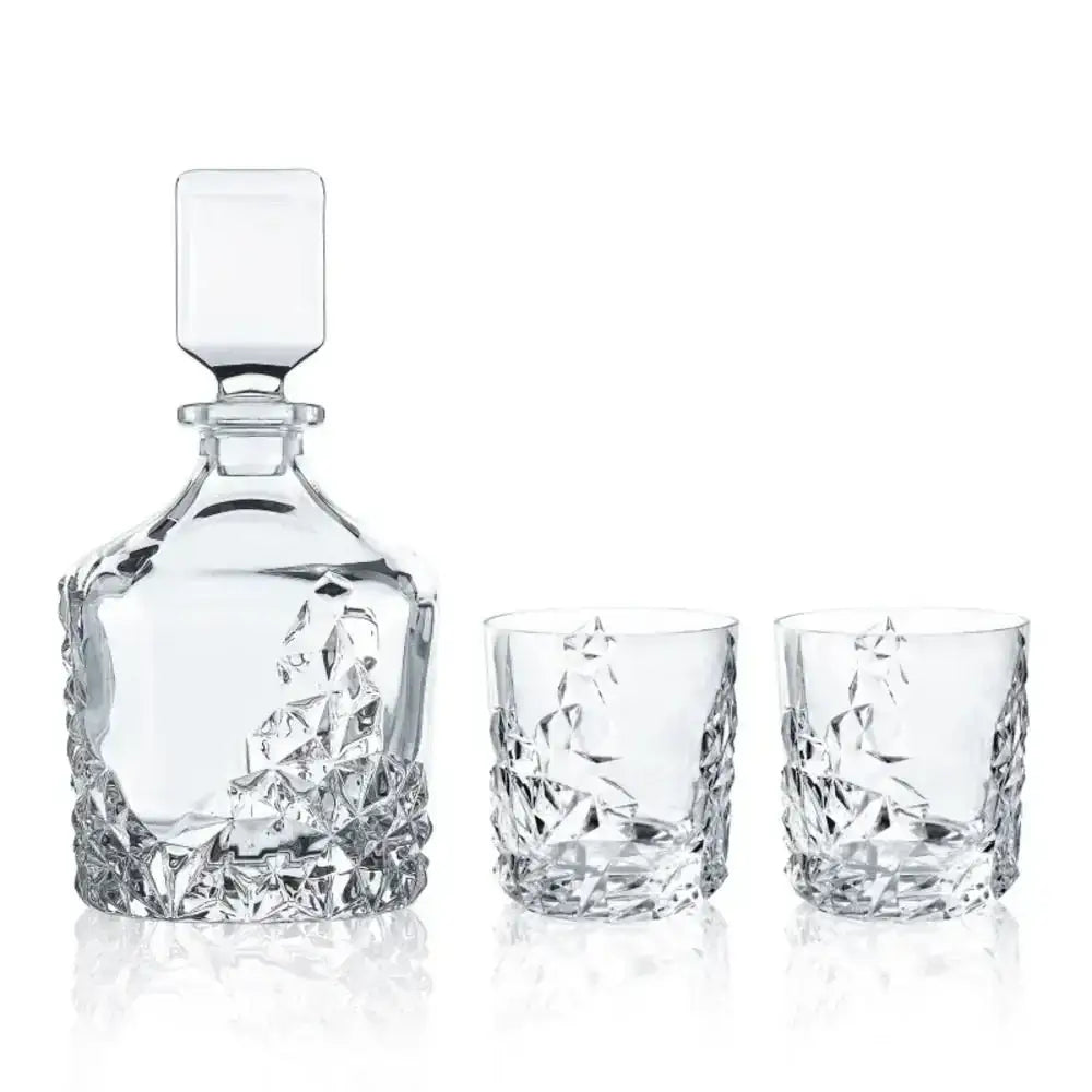 Crystal decanter and two glasses on a white background
