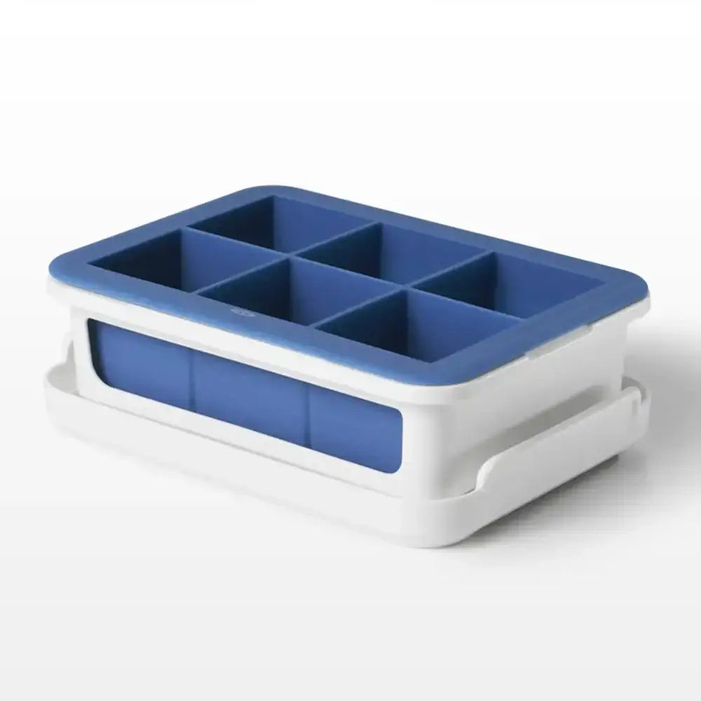 Blue and white silicone ice cube tray on a white background