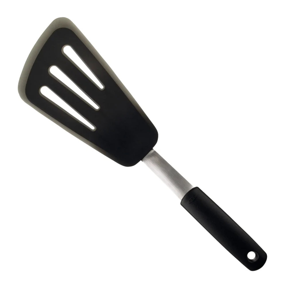 Black slotted spatula with a white background
