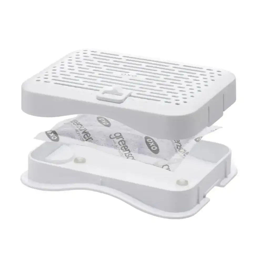 White object with a textured surface and a small compartment on a white background