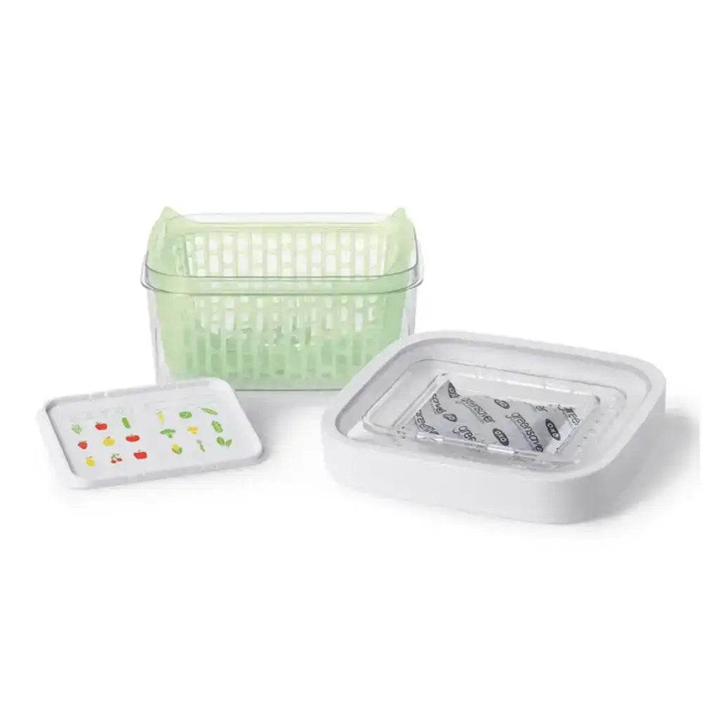Set of three plastic containers with a green basket, white lid, and transparent container on a white background.