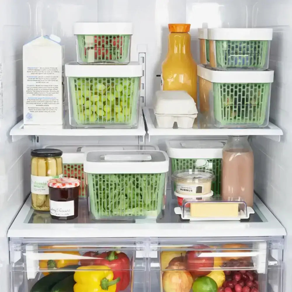 Fridge interior with organized food containers and fresh produce