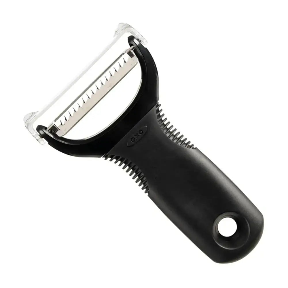 Black vegetable peeler with metal blade on a white background