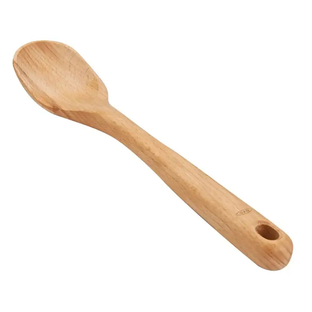 Wooden spoon on a white background